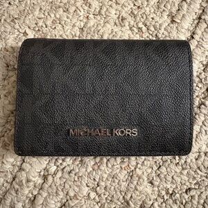 Michael Kors Black Pebbled Leather Fold Wallet with Silver Logo